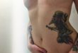 corps nu de femme tatouée